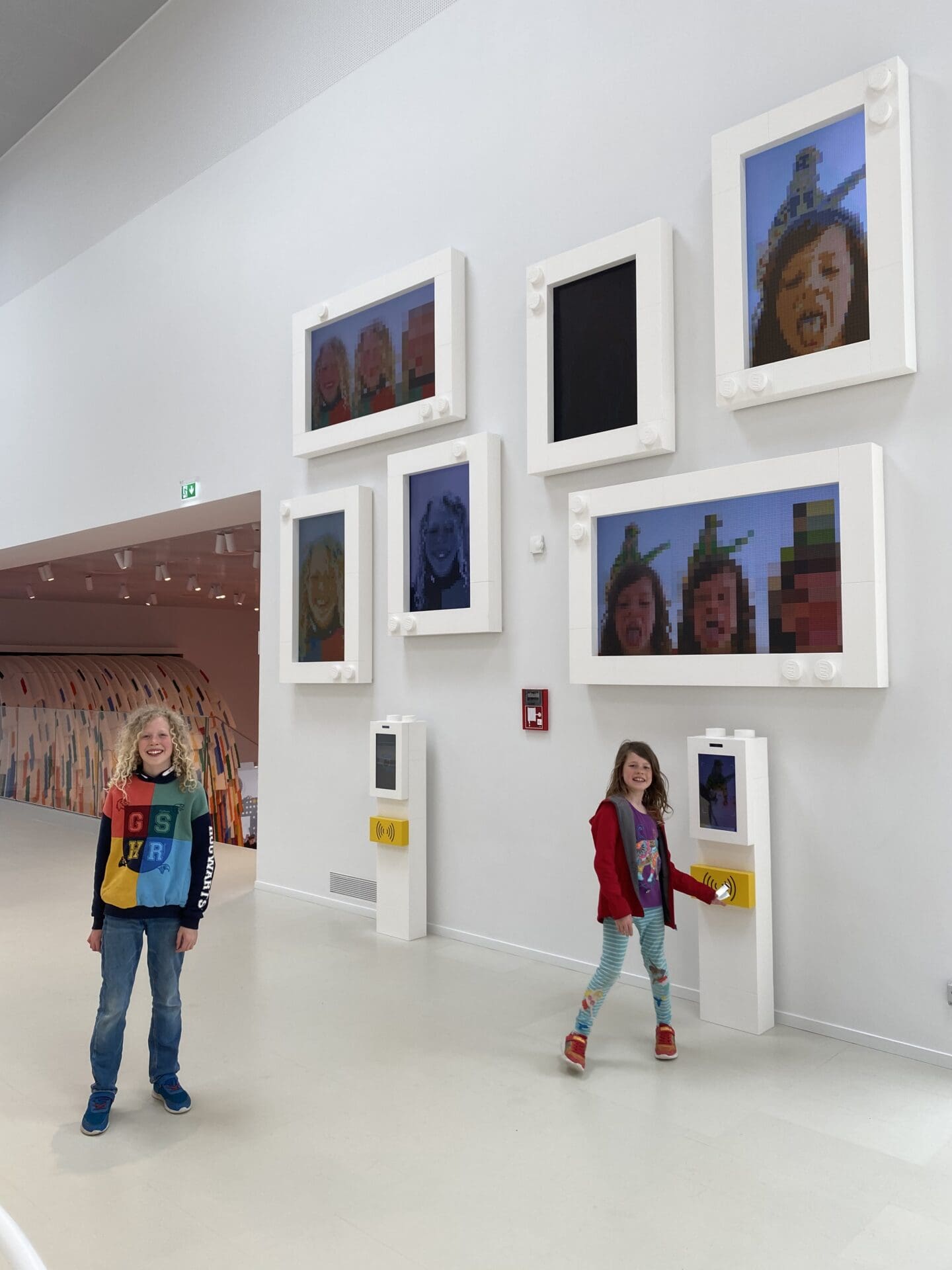 Children taking Lego photos at Lego House